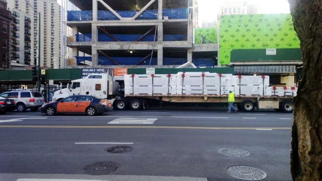 New Siding Delivery Godfrey Hotel