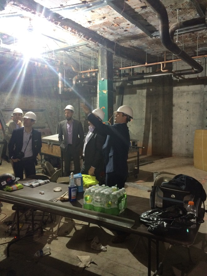 Larry Cassillo, our GM, provides a tour of The Godfrey Boston - and is pictured where the lobby front desk will be.